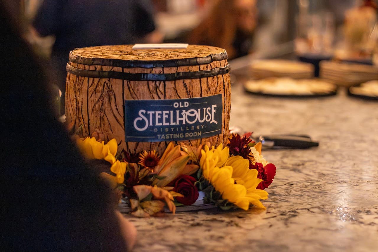 An Old SteelHouse mini barrel with sunflowers on the bar