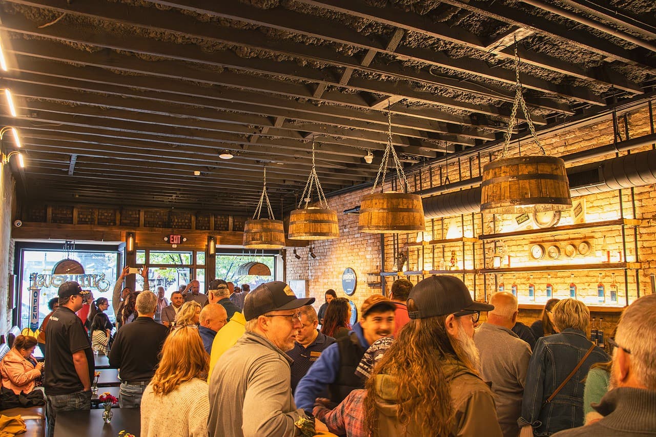 A crowd of guests inside the Old SteelHouse tasting room